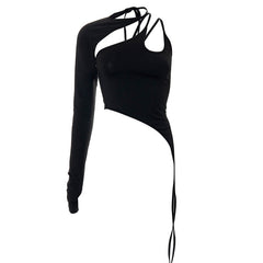 Asymmetric black crop top with one long sleeve, cut-out details, and strappy accents, perfect for bold and modern styling.