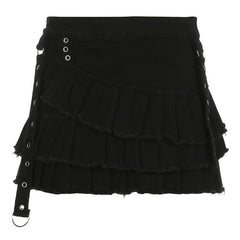 Black layered pleated mini skirt with side eyelet details and adjustable straps.