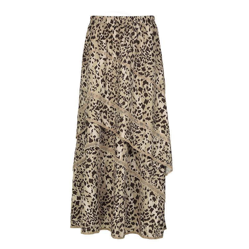 Boho leopard print maxi skirt with tiered ruffles and elastic waistband.