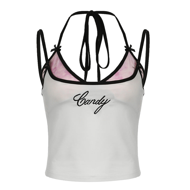 Halter camisole with "Candy" embroidery and contrasting trim, featuring semi-sheer accents and adjustable straps for a stylish summer look.