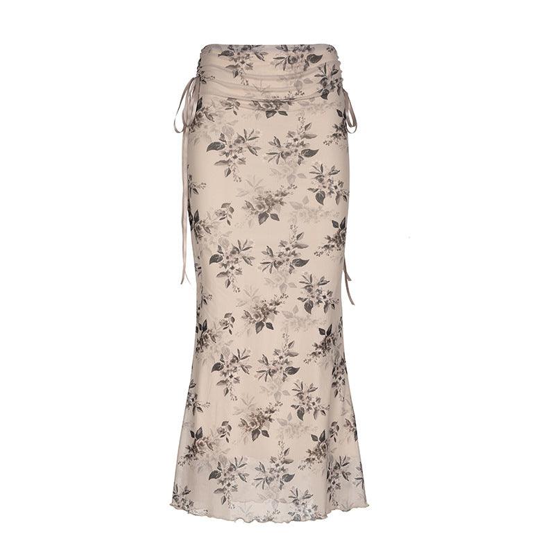 Floral drawstring trumpet skirt with a vintage, romantic design, perfect for daily wear and special occasions.

