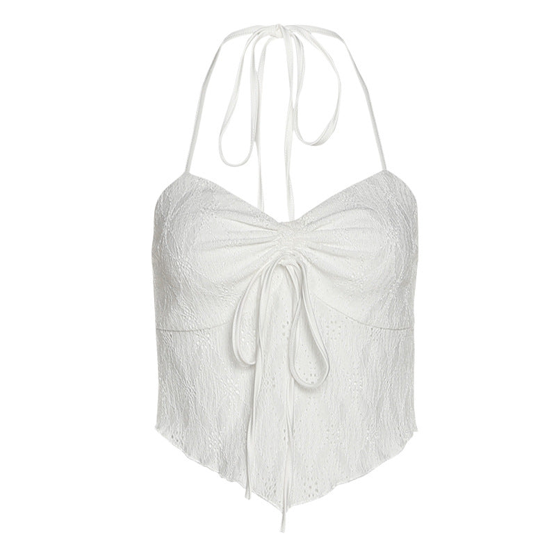 Halter top with tie-front detail and halter neck, perfect for summer styling.