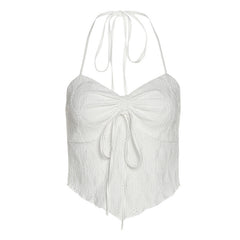 Halter top with tie-front detail and halter neck, perfect for summer styling.