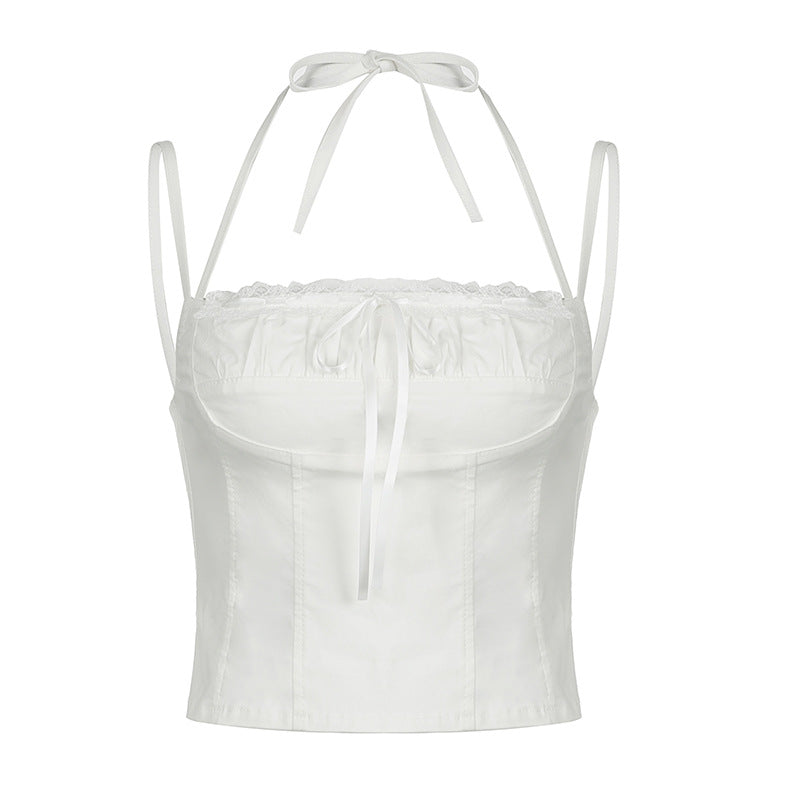 White corset-style halter top with lace trim and adjustable ties, offering a chic and feminine look.