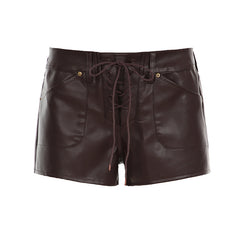 Brown lace-up faux leather shorts with a sleek finish, perfect for a chic and edgy style.