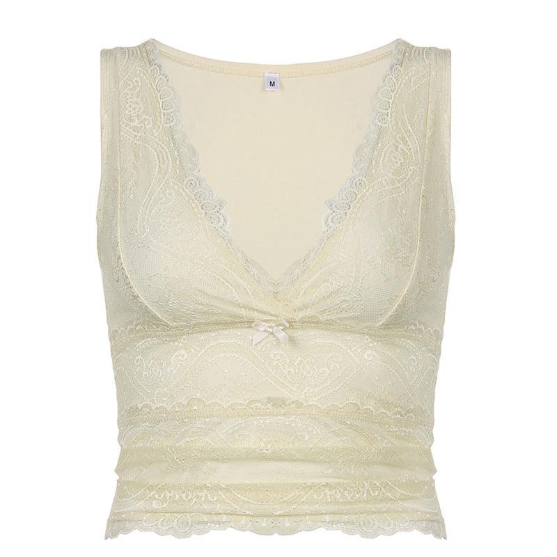 Lace V-neck ruched cami top with delicate lace trim and bow accent.