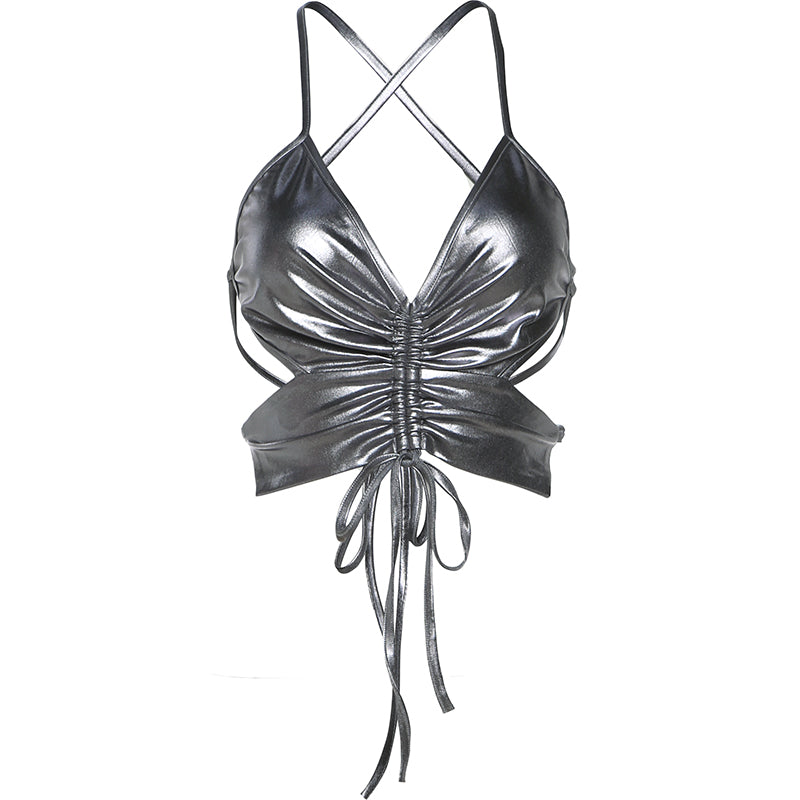 Metallic silver halter crop top with ruched detailing and crisscross straps, perfect for bold party or streetwear outfits.

