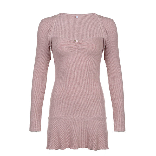 Ribbed knit mini dress with long sleeves, featuring a fitted silhouette and subtle ruching at the bust.