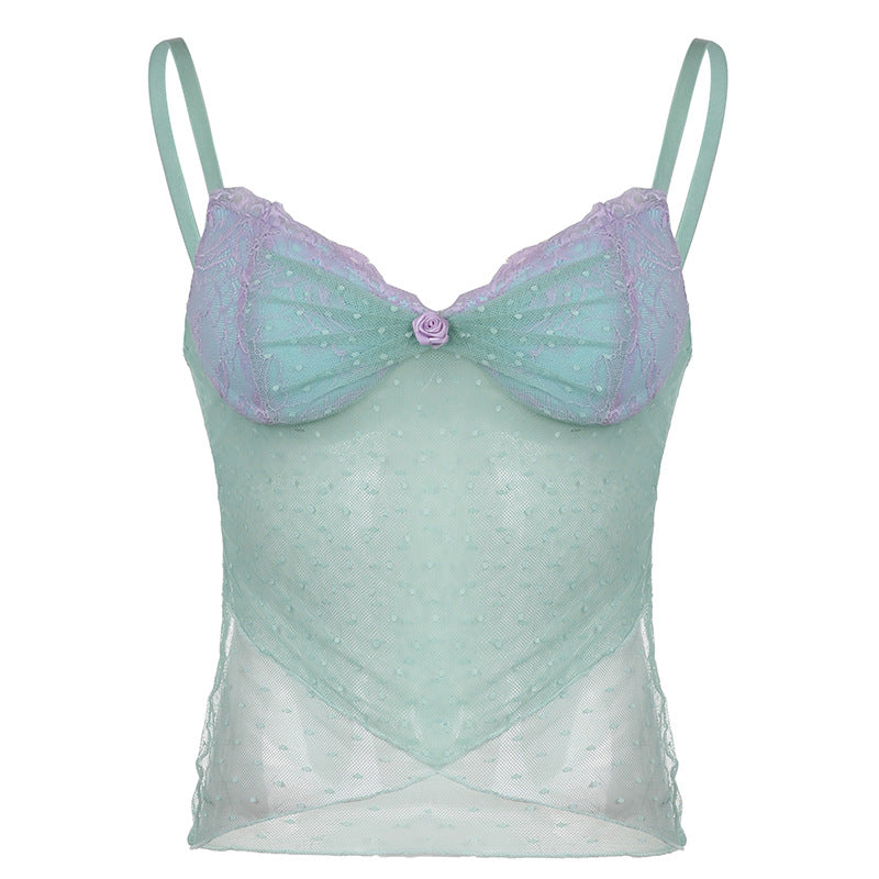 Mint green sheer camisole with lilac lace details and a rose accent, paired with casual denim for a chic and feminine style.