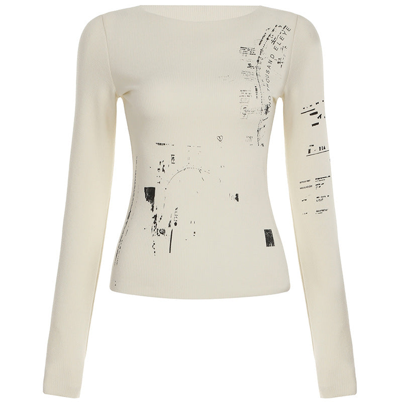 Slim-fit long-sleeve ribbed top with vintage-inspired abstract graphic prints, perfect for edgy streetwear.

