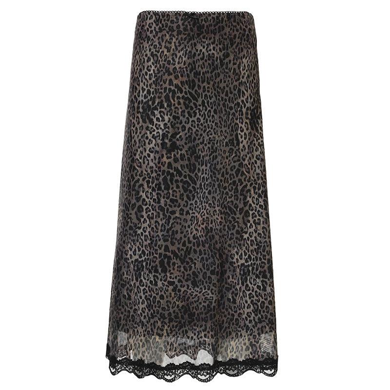 A vintage-inspired maxi skirt featuring a unique combination of leopard print and lace patchwork, blending elegance with bold, wild charm.