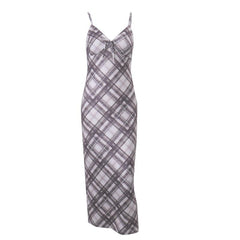 Vintage plaid cami dress with a form-fitting silhouette.